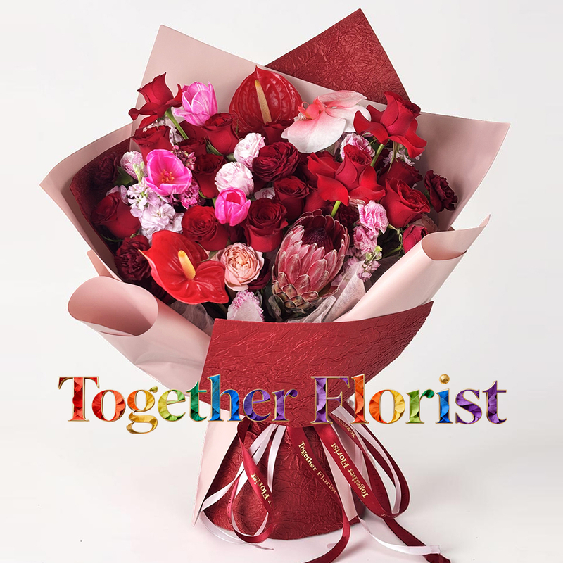 A bouquet of protea mixed with orchids and tulips, fl0000-XH0402