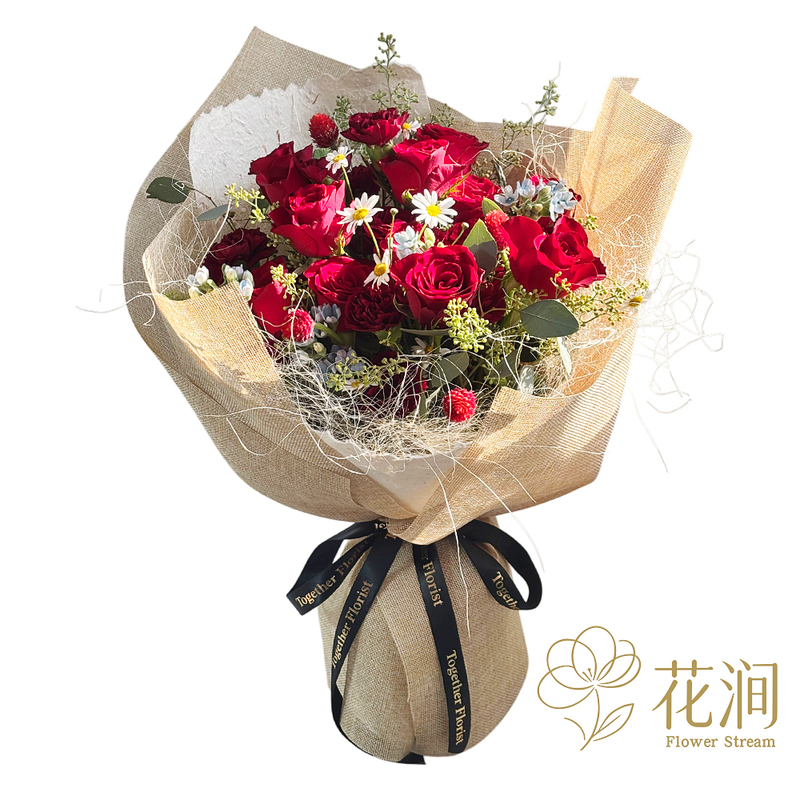 A bouquet of red roses mixed with lace multi-headed roses, and red silk carnations