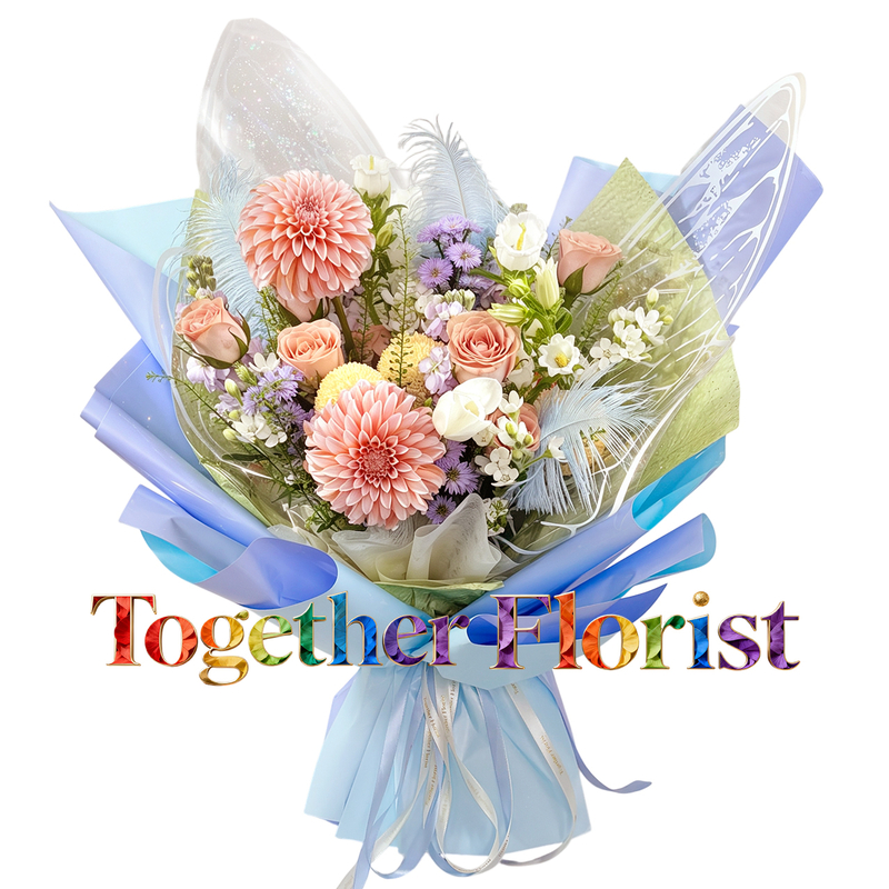 A bouquet of creamy peach dahlias mixed with tulips, and cappuccino roses.