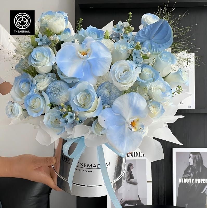 Phalaenopsis (spray color)，Ping Pong Chrysanthemums and Crushed Ice Blue Rose  Mixed Flower Bucket(fl00007-079)