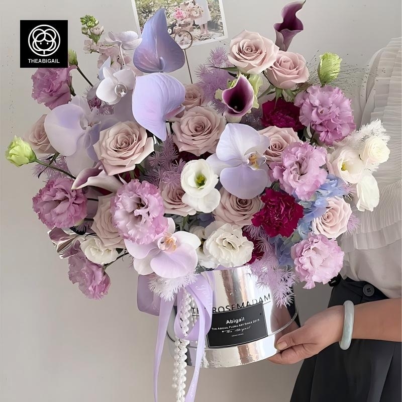 Phalaenopsis (spray color) ， Manta Roses and  Carnation Mixed Flower Bucket(fl00007-057)